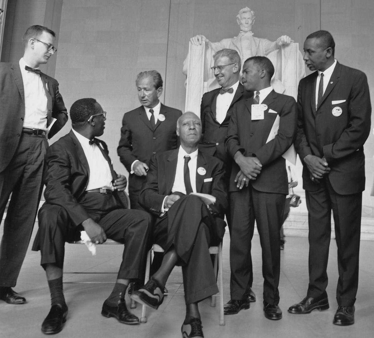 A. Philip Randolph with other leaders of the 1963 March on Washington in front of a statue of Abraham Lincoln.