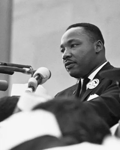 Martin Luther King Jr delivering a speech