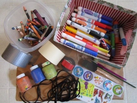 markers, stickers, scissors, and crayons
