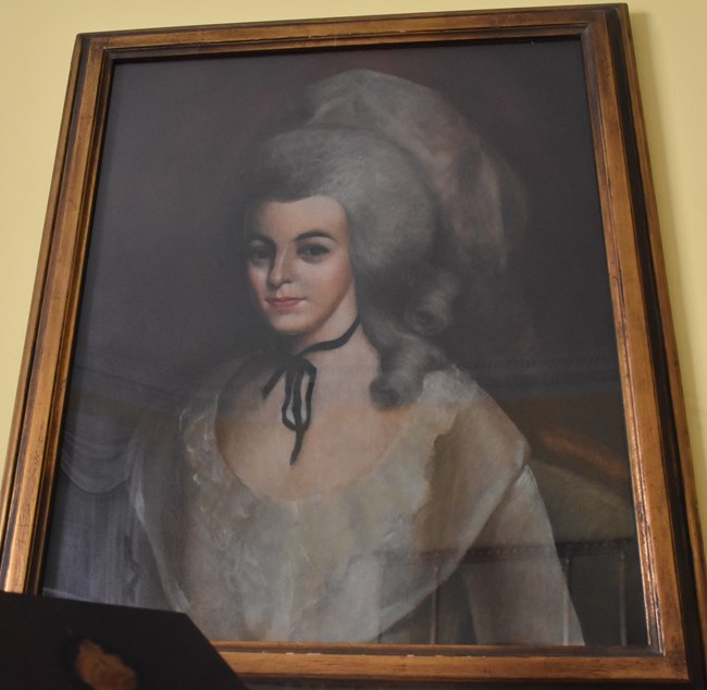 A painted portrait of Eliza Hamilton.