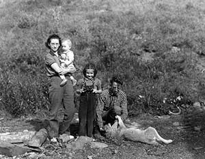 This 1940 photograph shows Adolph Murie, his wife Louise, son Jan, and daughter Gail in Mt. McKinley National Park.