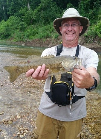 Man holding a smallmouth bass