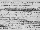 Black and white image of the rough draft of the Declaration of Independence.