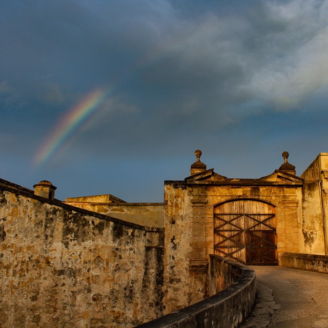 Rainbow in sky over front entrance to the fort.