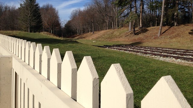 A park trail with snow.