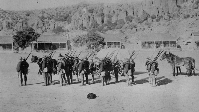 A group of soldiers with guns. 