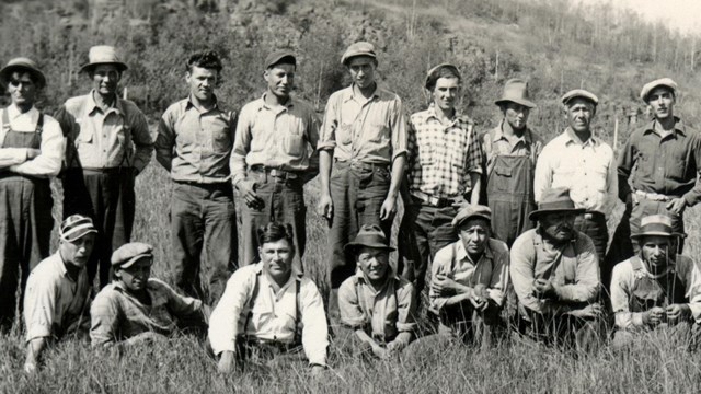 A group of people in historic clothing from the 1930s.