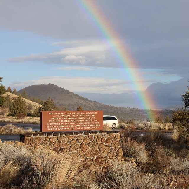 Rainbow over the visitor center parking lot.