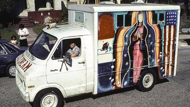 Ice cream truck with the Virgin Mary and an American Flag painted on the side