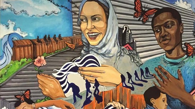 Mural representing humans in various forms of becoming an American.