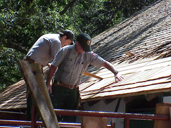Replacing shingles on historic structures.