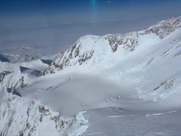 14k’ Camp sits empty awaiting climbers High altitude image of a snow covered mountain peak.