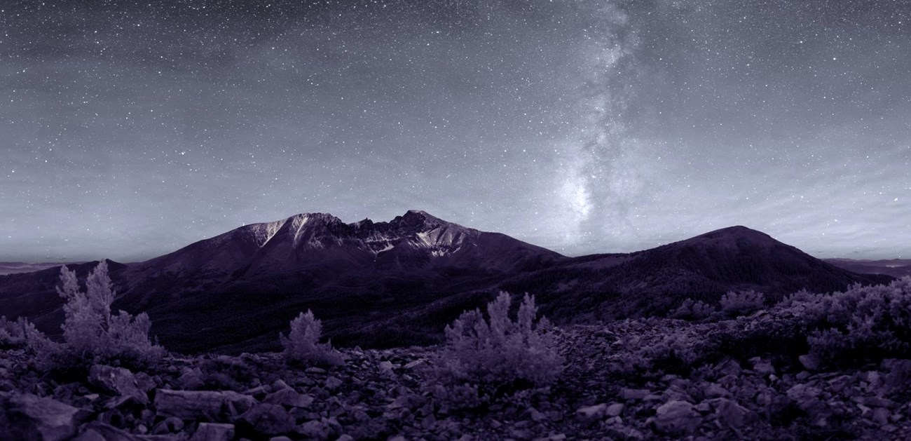 Jeff Davis Peak and Wheeler Peak illuminated by the light of the Milky Way.