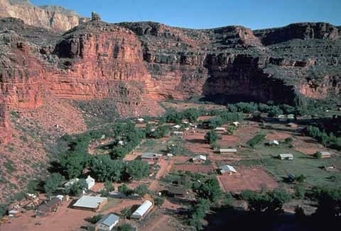 aerial view looking down onto fields and houses in Supai Village.
