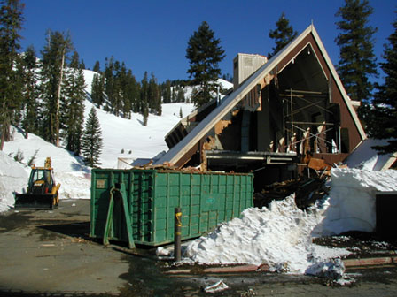 NPS crews begin taking the old ski chalet down piece by piece