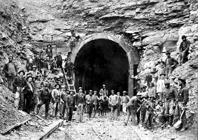 workers constructing a RR tunnel