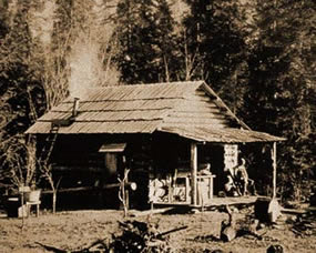 historic sepia-toned photo of cabin historic sepia-toned photo of cabin