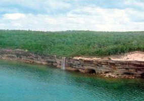 This aerial view of Spray Falls and the Pictured Rocks cliffs was taken from a small airplane.&nbsp;