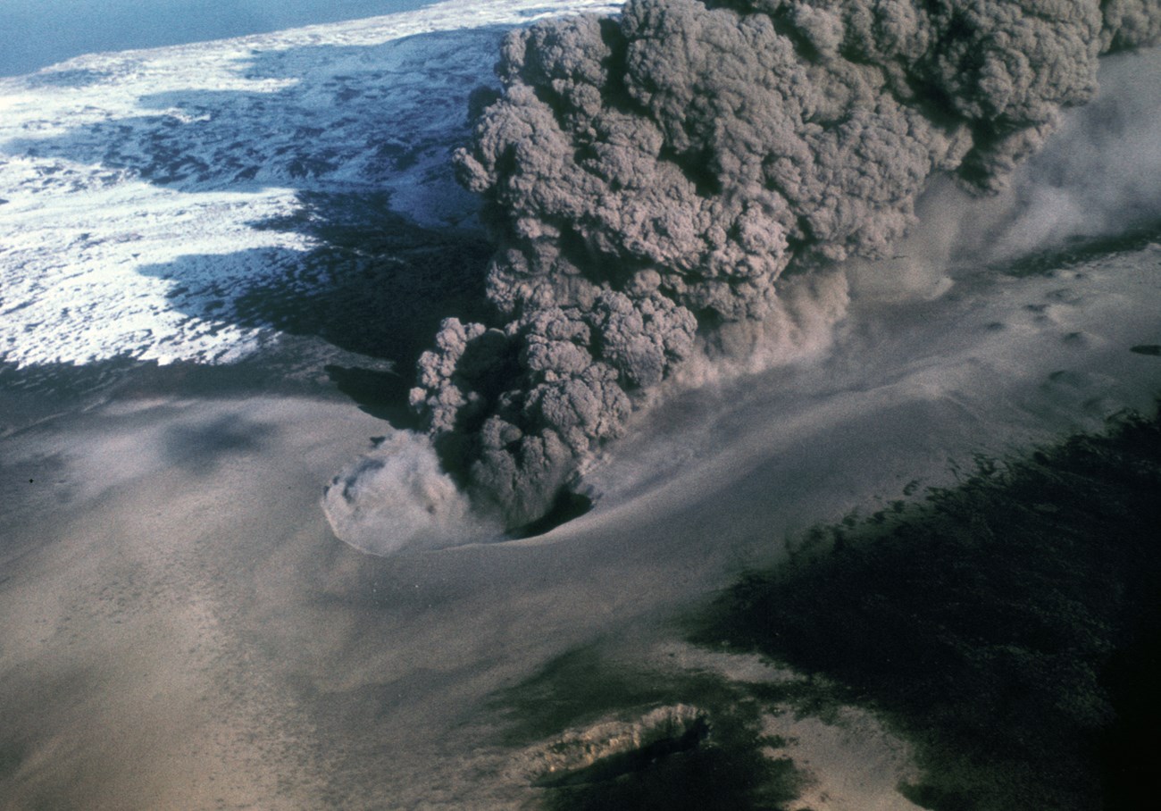 aerial view of an erupting volcano