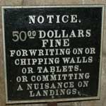 Old Fine notice in stairwell
