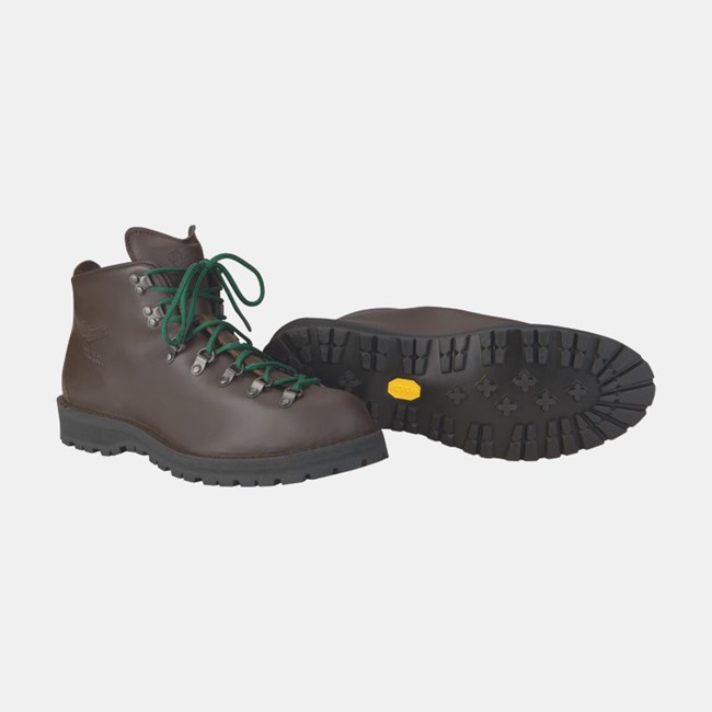 Hiking Boots A pair of brown hiking boots with green laces and a Vibram sole