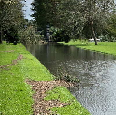 Chalmette Battlefield after Hurricane Ida a flooded road leading to a closed gate