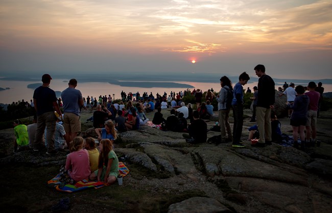 Crowd on top of mountain for sunrise