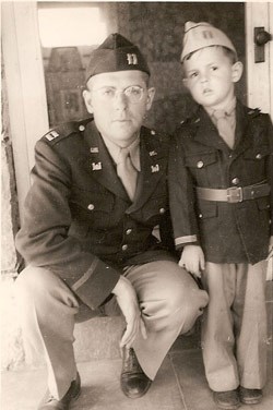 World War II-era image of uniformed Clifford McGinnis and his son