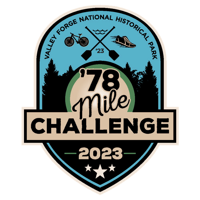 a logo with a rounded top and pointed bottom. a sky blue background with a bicycle, a running shoe, and two paddles crossed appear above a treeline of pine trees. Text reads Valley Forge National Hitorical Park '78 Mile Challenge 2023.