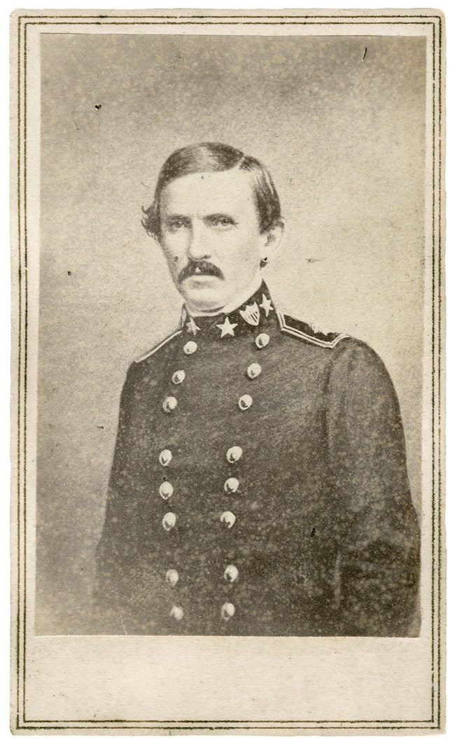 A black and white image of Crittenden with superimposed uniform.