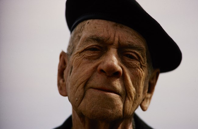 Headshot of Freeman Tilden wearing a beret