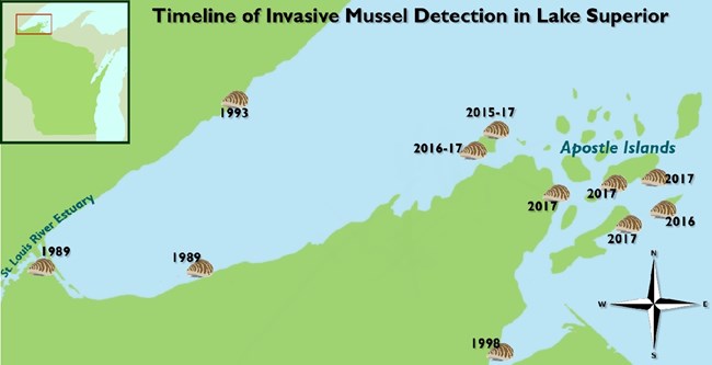 A map entitled, “Timeline of Invasive Mussel Detection in Lake Superior”, shows the western end of Lake Superior. An invasive mussel is shown at each location they have been detected along with the years detected, ranging from 1989 – 2017.