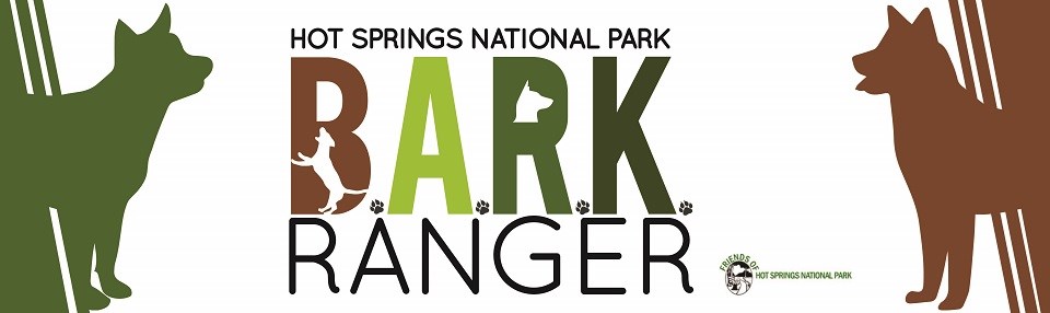 A banner that says Hot Springs National Park Bark Ranger with a green and brown dog on either side.