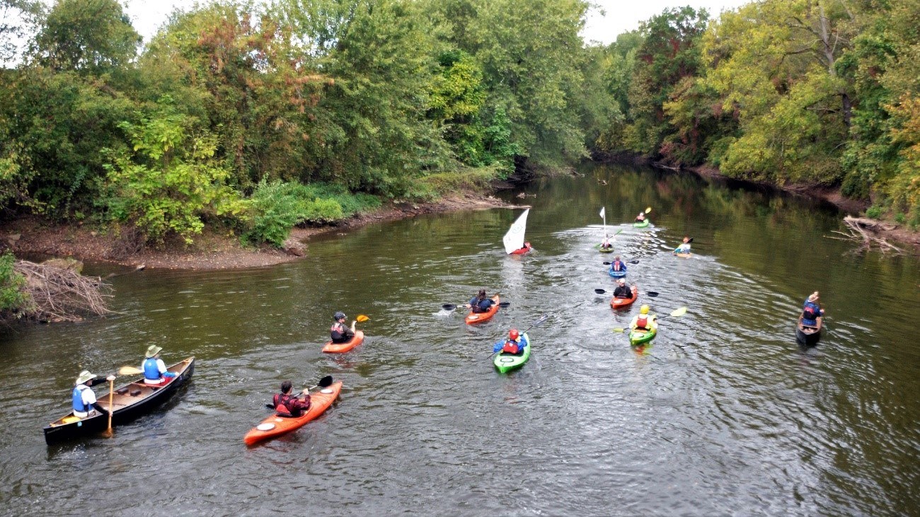 A top view of several paddlers on the Cuyahoga River