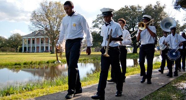 All Around Jazz Band Young jazz band walking along a sidewalk
