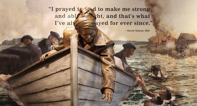 Harriet Tubman Underground Railroad National Historical Park Statue of Harriet Tubman in a boat reaching for people in the water