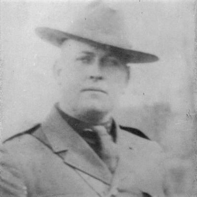 New York State Police Officer in the 1920s Black and white photo of a male police offer, with wide brimmed hat and a tie