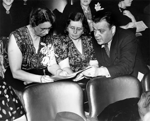 Rose Schneiderman seated between Mrs. Eleanor Roosevelt and David Dubinsky