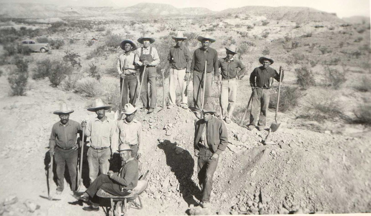 Historic photo of a group of people at a fossil quarry.
