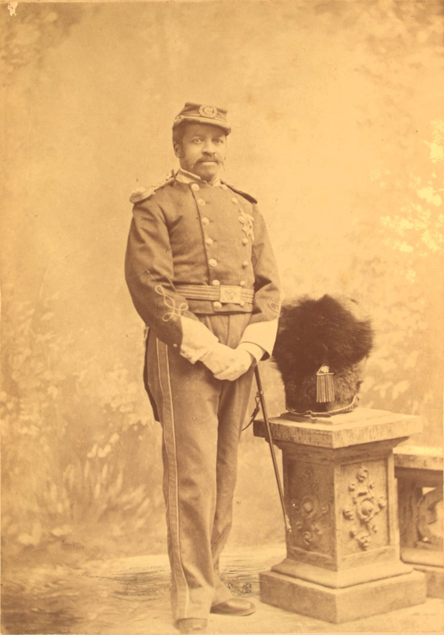 Black veteran Christian A. Fleetwood in the uniform of a Captain of the Washington Cadet Corps. On his chest, the Butler Colored Troops Medal and the Medal of Honor. He was a Captain of the WCC from 1880-1887, and in the DCNG from 1887-1892.