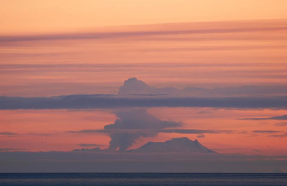 volcanic eruption seen at a distance