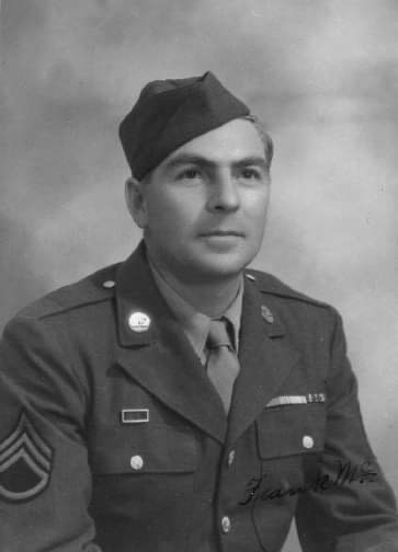 Black and white headshot of white man in military uniform and cap