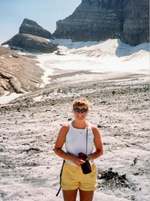 Lisa at Grinnell in 1988 An old photo of a young person standing on a glacier