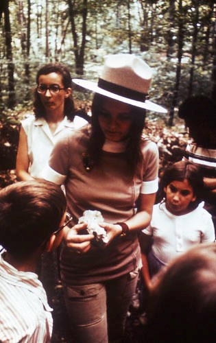 Woman wearing non-standard pants Women demonstrating to kids