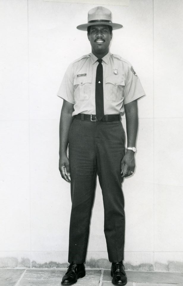 Robert Stanton poses in his uniform and broad-brimmed hat.