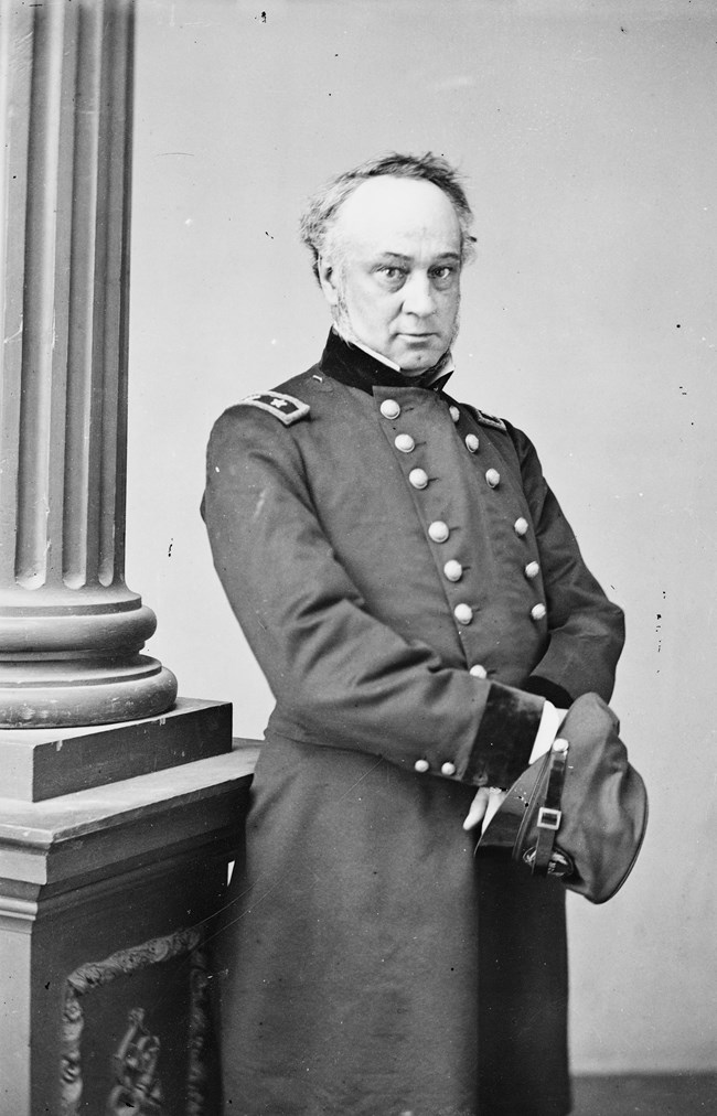 General-in-Chief Henry Halleck A black and white photograph of a man, standing, in United States military uniform.