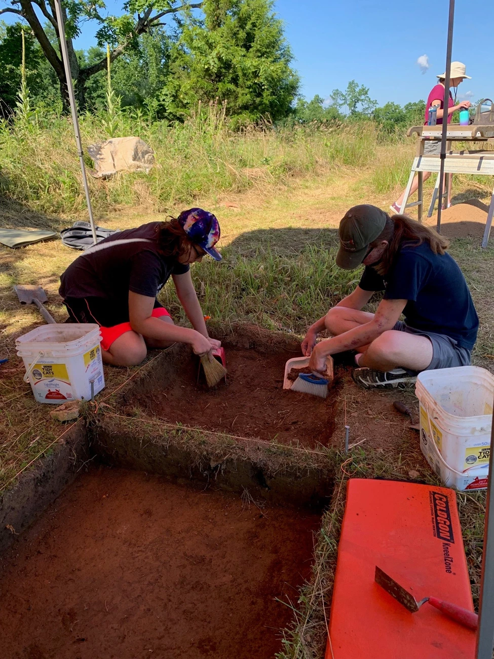 IG Story Photo 1 - Archaeology Oldham County Takeover the Network Two high school students work inside an archaeological pit.