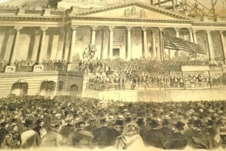 A yellowed print of a large crowd gathered in front of the Capitol building. An American flag is flying in the breeze over a canopy atop the steps.