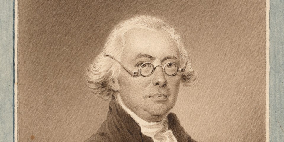 Watercolor of James Wilson in overcoat and glasses