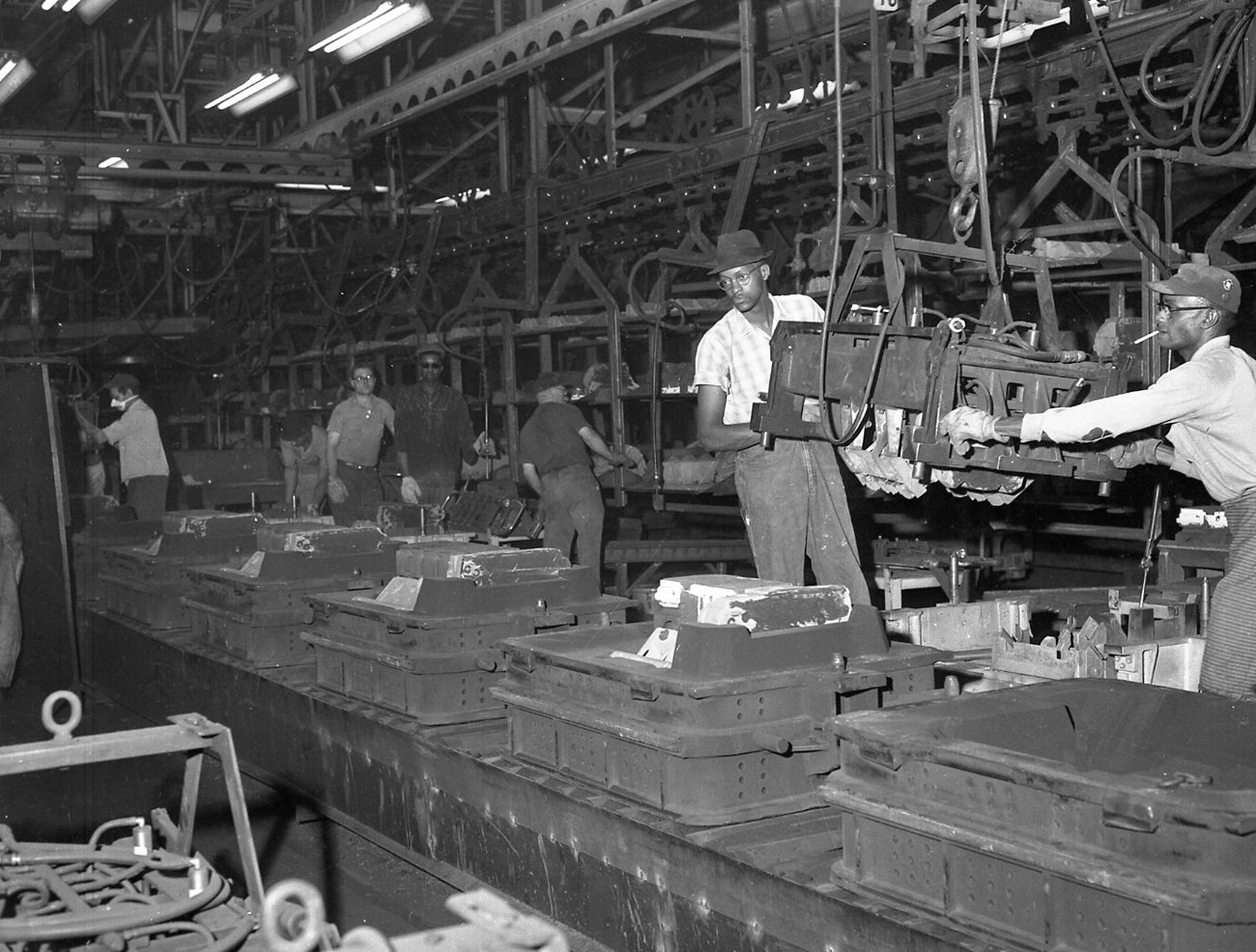 Men working on the Flint Buick assembly line